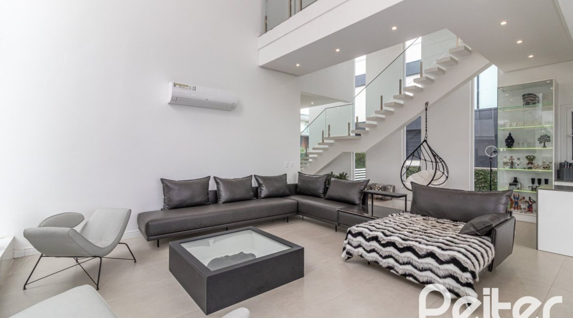 Casa em Condomínio à venda com 309m², 3 dormitórios, 2 suítes, 4 vagas, no bairro Alphaville em PORTO ALEGRE