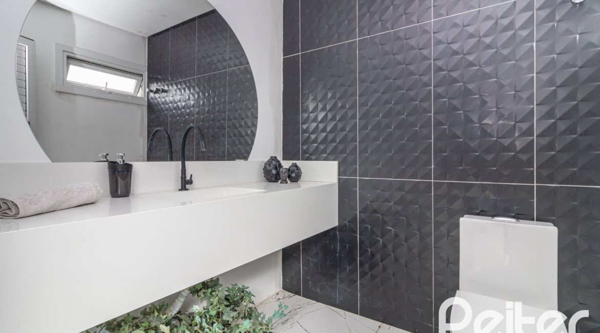 Casa em Condomínio à venda com 309m², 3 dormitórios, 2 suítes, 4 vagas, no bairro Alphaville em PORTO ALEGRE