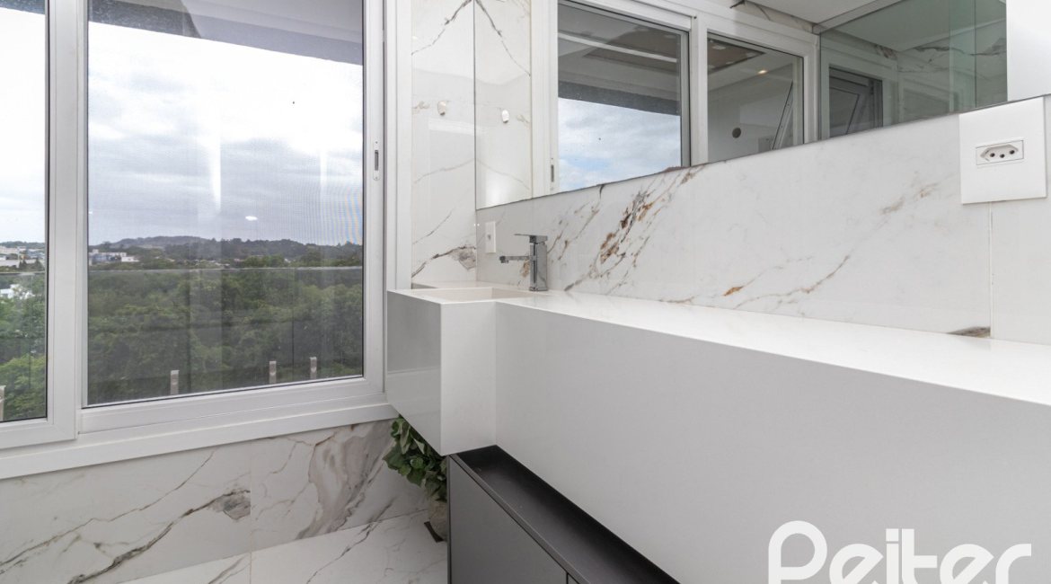 Casa em Condomínio à venda com 309m², 3 dormitórios, 2 suítes, 4 vagas, no bairro Alphaville em PORTO ALEGRE