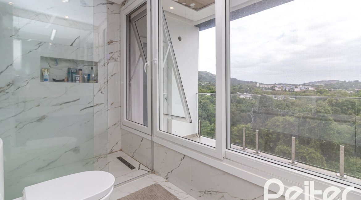 Casa em Condomínio à venda com 309m², 3 dormitórios, 2 suítes, 4 vagas, no bairro Alphaville em PORTO ALEGRE