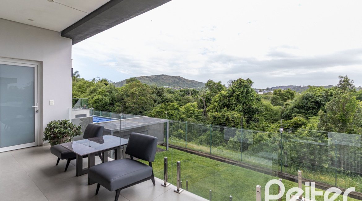 Casa em Condomínio à venda com 309m², 3 dormitórios, 2 suítes, 4 vagas, no bairro Alphaville em PORTO ALEGRE