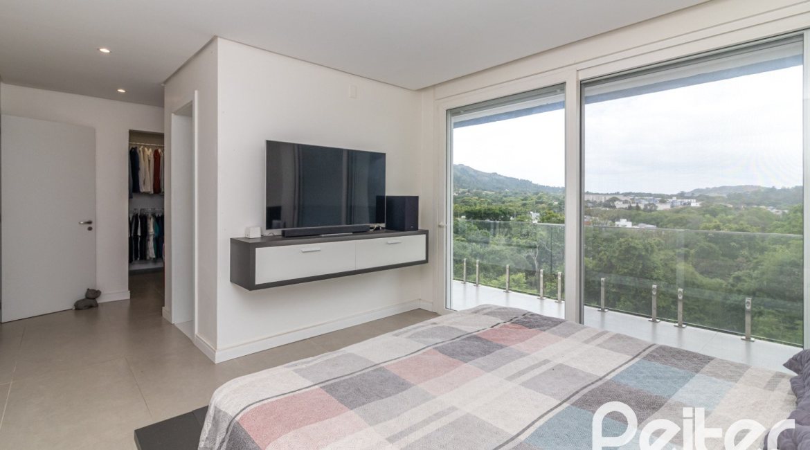 Casa em Condomínio à venda com 309m², 3 dormitórios, 2 suítes, 4 vagas, no bairro Alphaville em PORTO ALEGRE