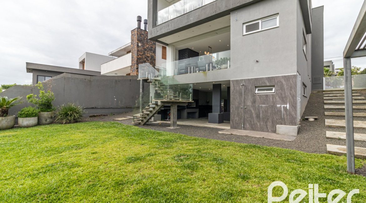 Casa em Condomínio à venda com 309m², 3 dormitórios, 2 suítes, 4 vagas, no bairro Alphaville em PORTO ALEGRE