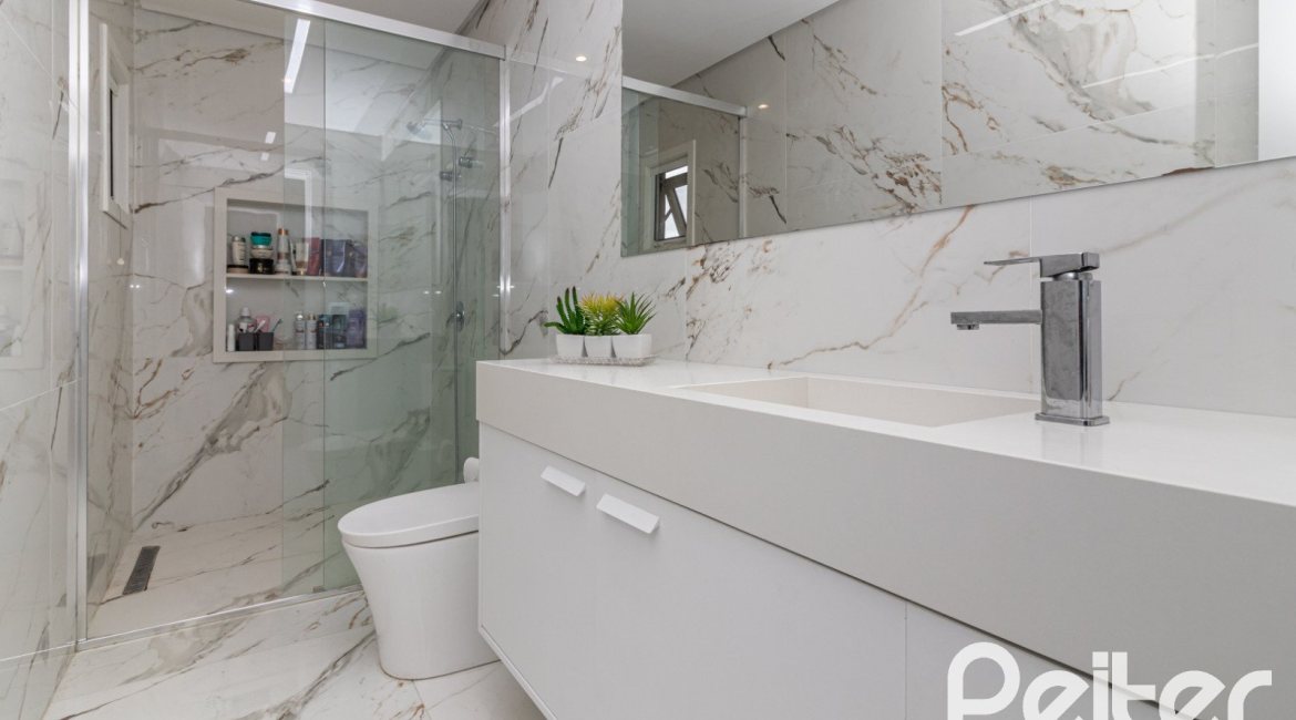 Casa em Condomínio à venda com 309m², 3 dormitórios, 2 suítes, 4 vagas, no bairro Alphaville em PORTO ALEGRE