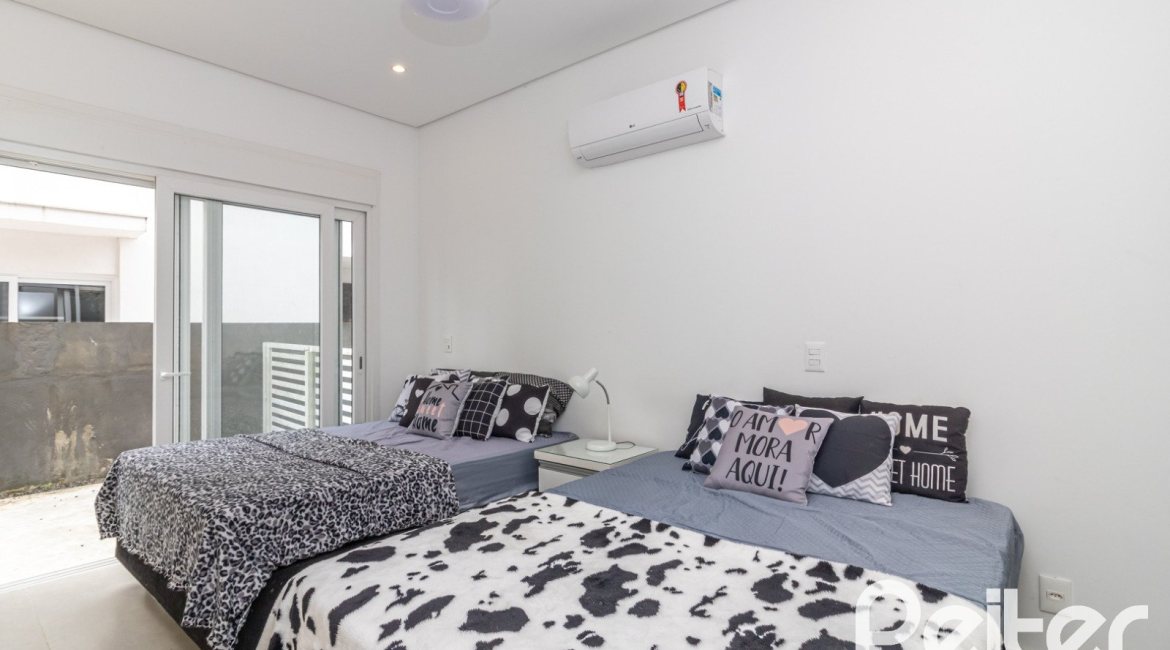 Casa em Condomínio à venda com 309m², 3 dormitórios, 2 suítes, 4 vagas, no bairro Alphaville em PORTO ALEGRE