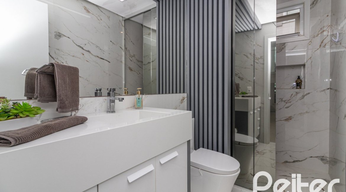 Casa em Condomínio à venda com 309m², 3 dormitórios, 2 suítes, 4 vagas, no bairro Alphaville em PORTO ALEGRE