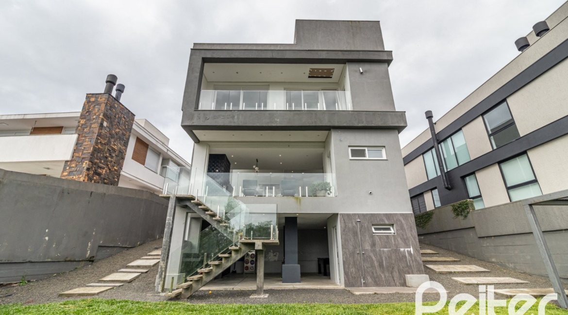 Casa em Condomínio à venda com 309m², 3 dormitórios, 2 suítes, 4 vagas, no bairro Alphaville em PORTO ALEGRE