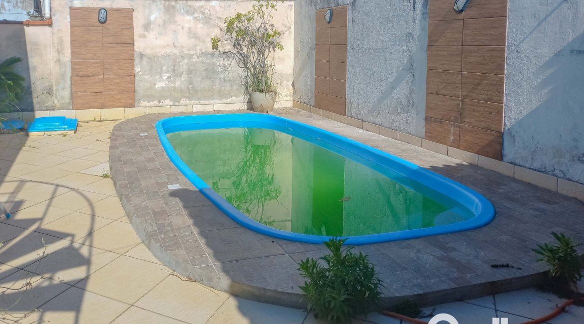 Casa à venda com 162m², 3 dormitórios, 1 suíte, 3 vagas, no bairro Guarujá em Porto Alegre