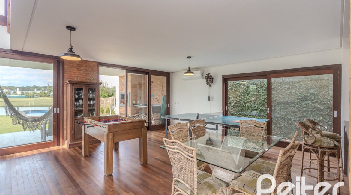 Casa em Condomínio à venda com 336m², 4 dormitórios, 4 suítes, 4 vagas, no bairro Terra Ville em PORTO ALEGRE