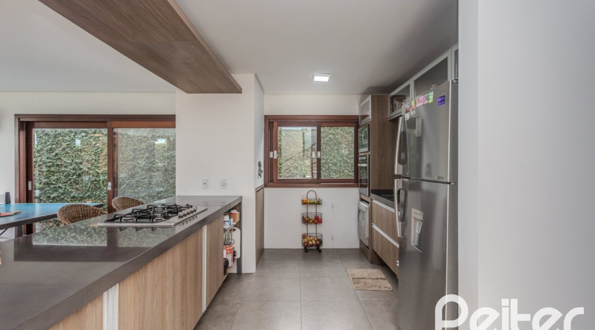 Casa em Condomínio à venda com 336m², 4 dormitórios, 4 suítes, 4 vagas, no bairro Terra Ville em PORTO ALEGRE