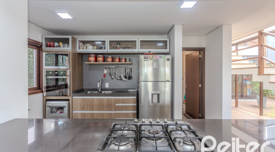 Casa em Condomínio à venda com 336m², 4 dormitórios, 4 suítes, 4 vagas, no bairro Terra Ville em PORTO ALEGRE