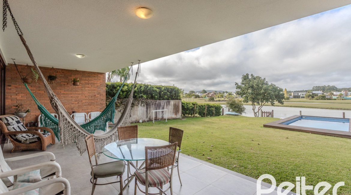 Casa em Condomínio à venda com 336m², 4 dormitórios, 4 suítes, 4 vagas, no bairro Terra Ville em PORTO ALEGRE