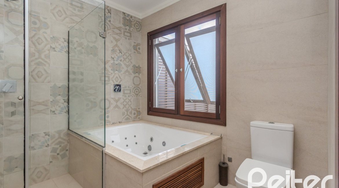 Casa em Condomínio à venda com 336m², 4 dormitórios, 4 suítes, 4 vagas, no bairro Terra Ville em PORTO ALEGRE