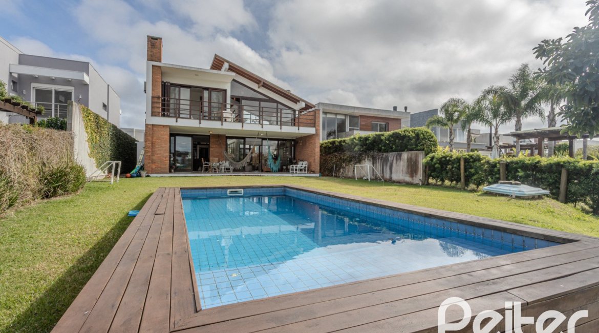 Casa em Condomínio à venda com 336m², 4 dormitórios, 4 suítes, 4 vagas, no bairro Terra Ville em PORTO ALEGRE