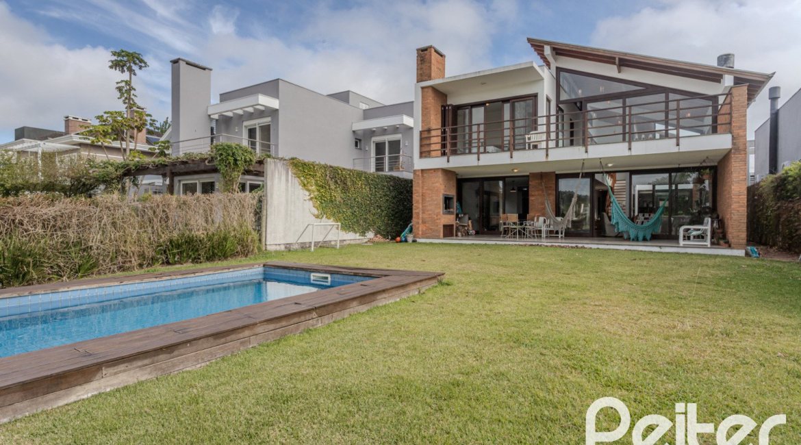 Casa em Condomínio à venda com 336m², 4 dormitórios, 4 suítes, 4 vagas, no bairro Terra Ville em PORTO ALEGRE