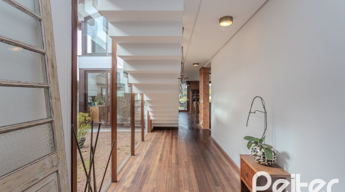 Casa em Condomínio à venda com 336m², 4 dormitórios, 4 suítes, 4 vagas, no bairro Terra Ville em PORTO ALEGRE