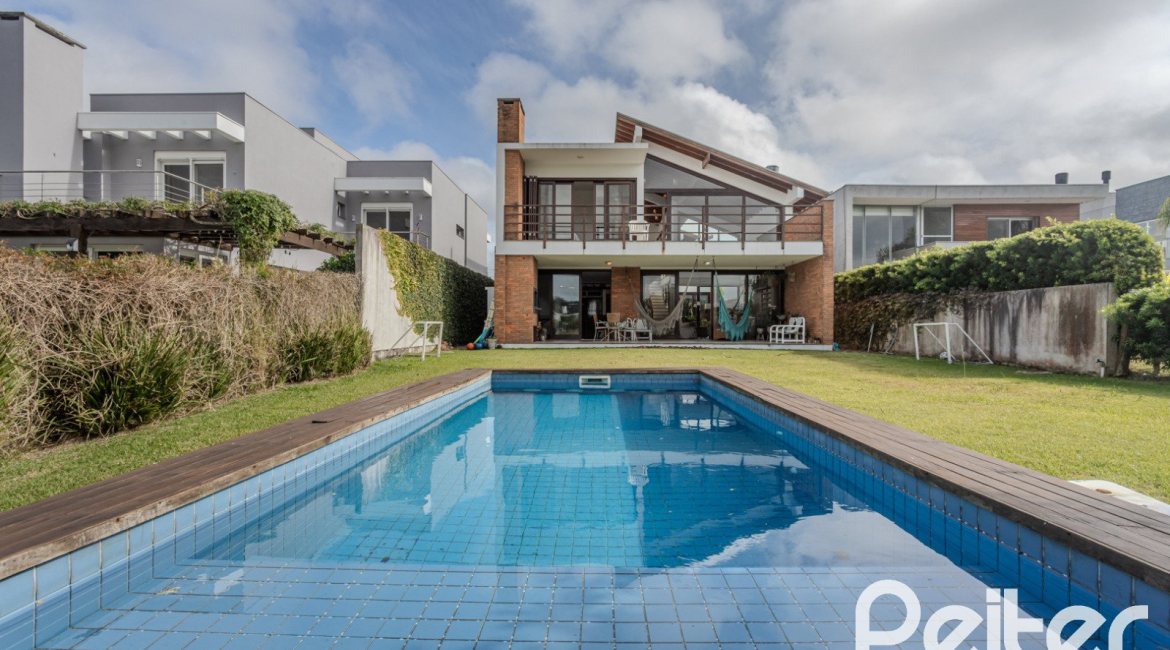 Casa em Condomínio à venda com 336m², 4 dormitórios, 4 suítes, 4 vagas, no bairro Terra Ville em PORTO ALEGRE