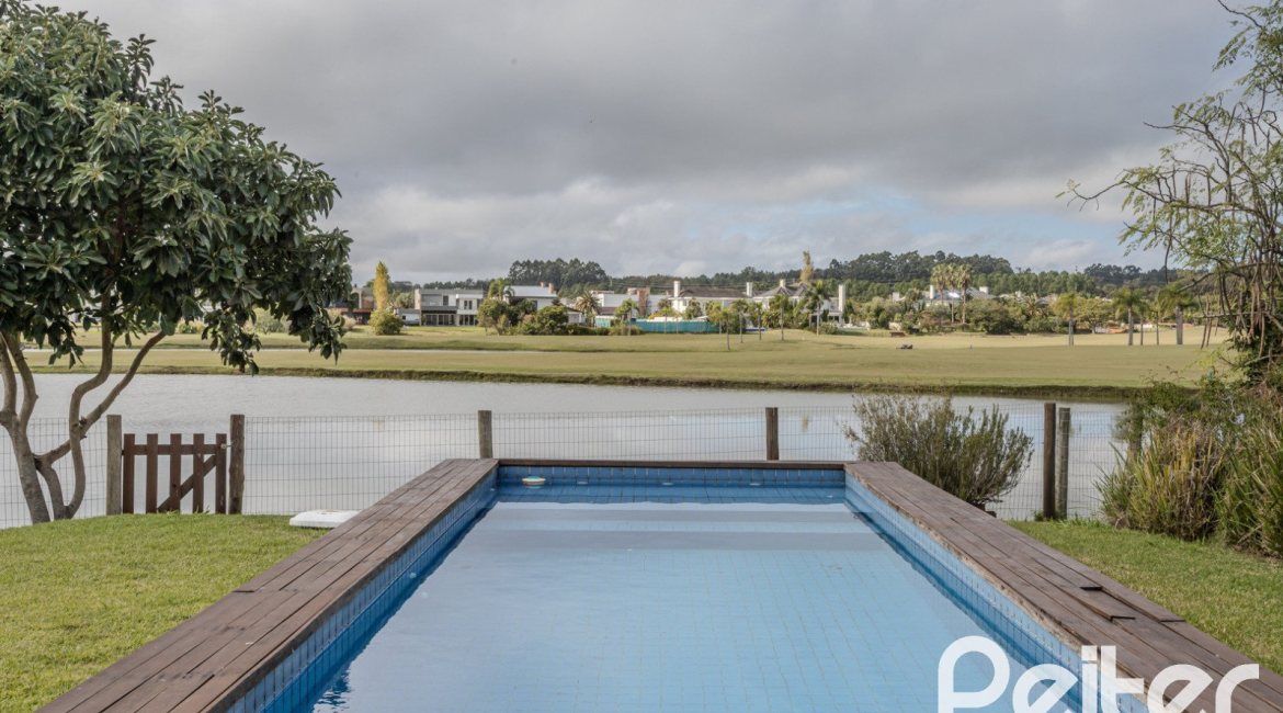Casa em Condomínio à venda com 336m², 4 dormitórios, 4 suítes, 4 vagas, no bairro Terra Ville em PORTO ALEGRE