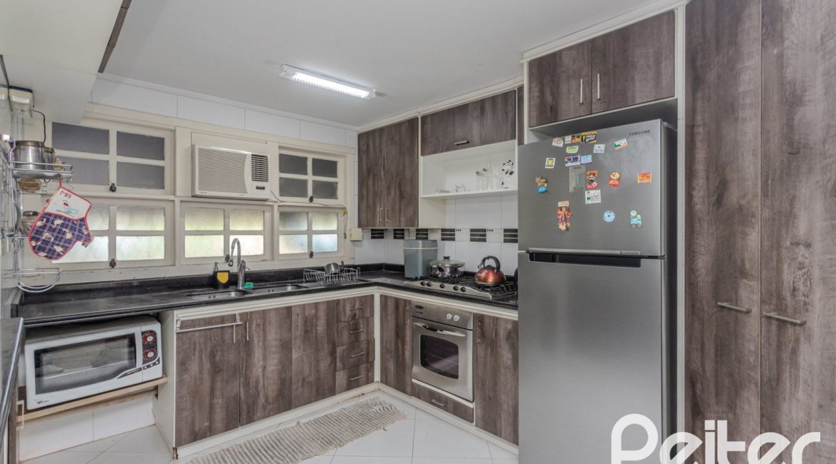 Casa em Condomínio à venda com 201m², 3 dormitórios, 1 suíte, 2 vagas, no bairro Tristeza em PORTO ALEGRE