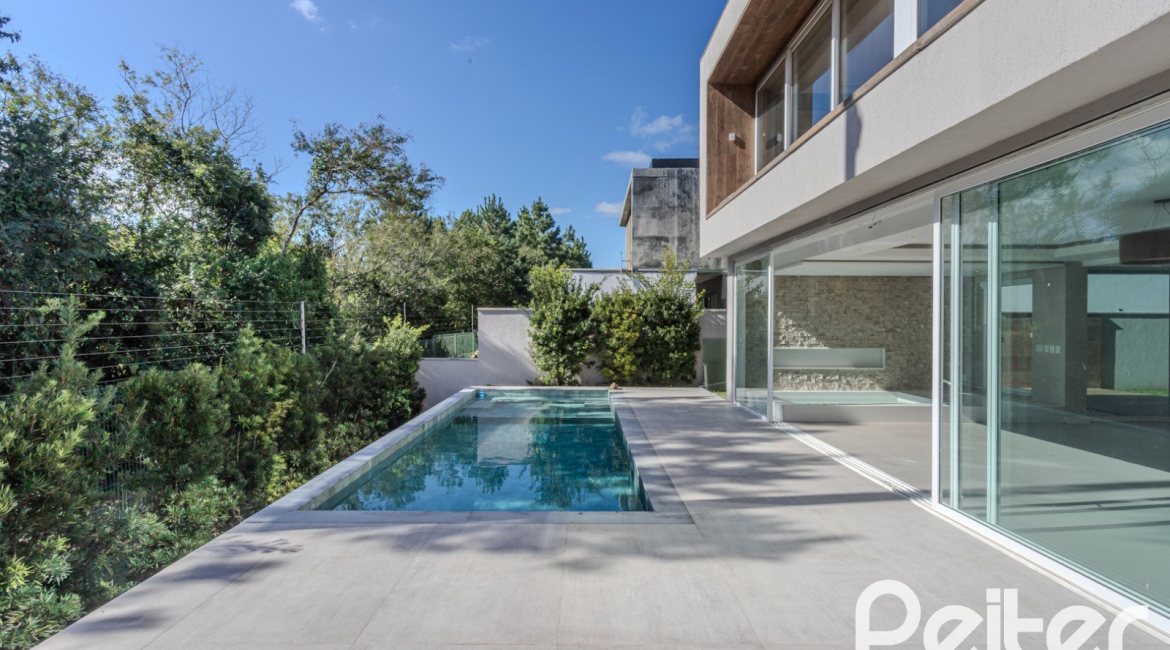 Casa em Condomínio à venda com 400m², 4 dormitórios, 4 suítes, 4 vagas, no bairro Alphaville em PORTO ALEGRE