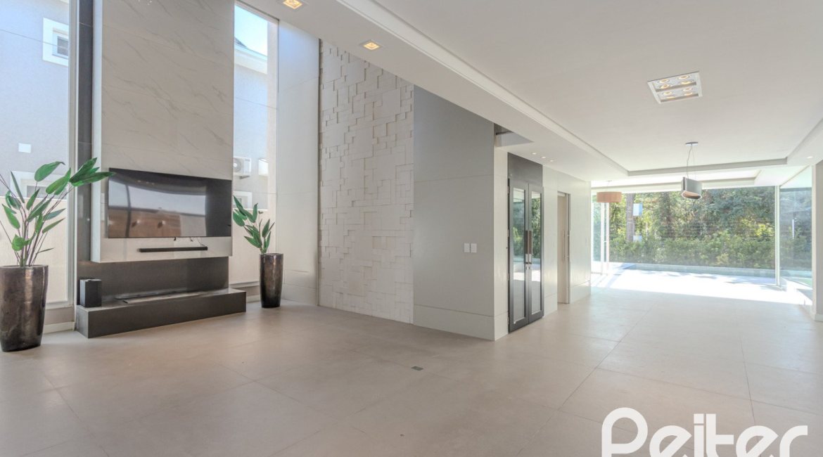 Casa em Condomínio à venda com 400m², 4 dormitórios, 4 suítes, 4 vagas, no bairro Alphaville em PORTO ALEGRE