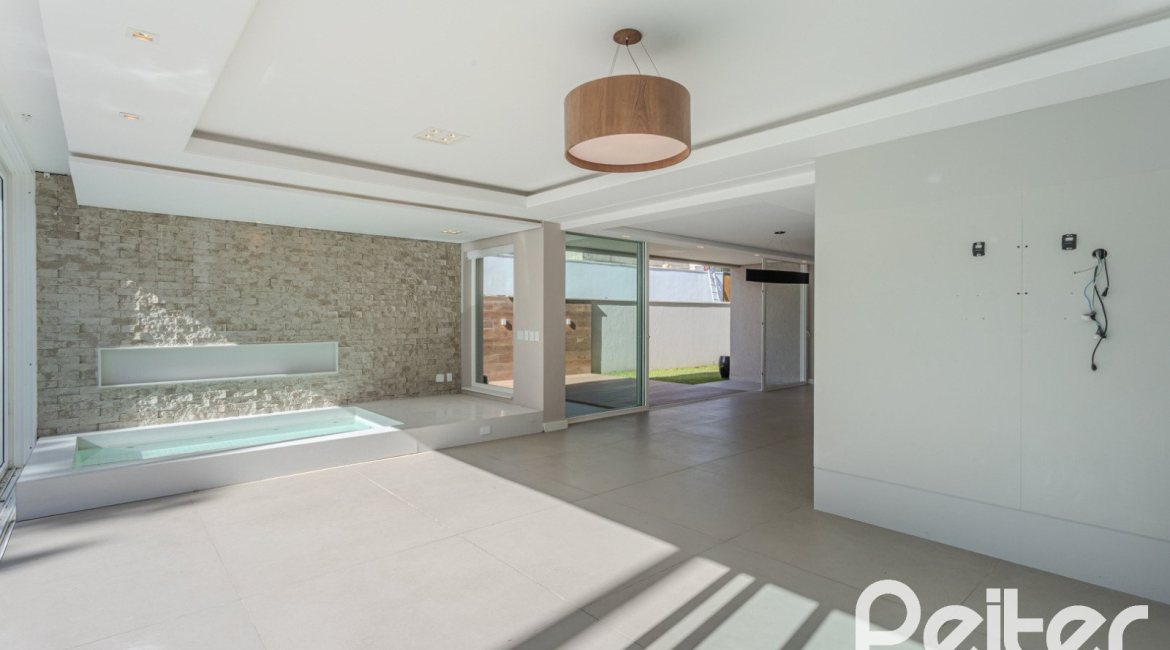 Casa em Condomínio à venda com 400m², 4 dormitórios, 4 suítes, 4 vagas, no bairro Alphaville em PORTO ALEGRE