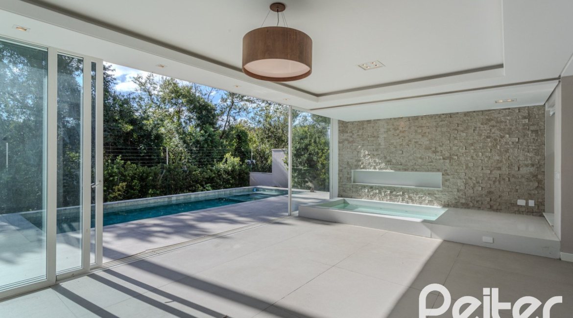 Casa em Condomínio à venda com 400m², 4 dormitórios, 4 suítes, 4 vagas, no bairro Alphaville em PORTO ALEGRE