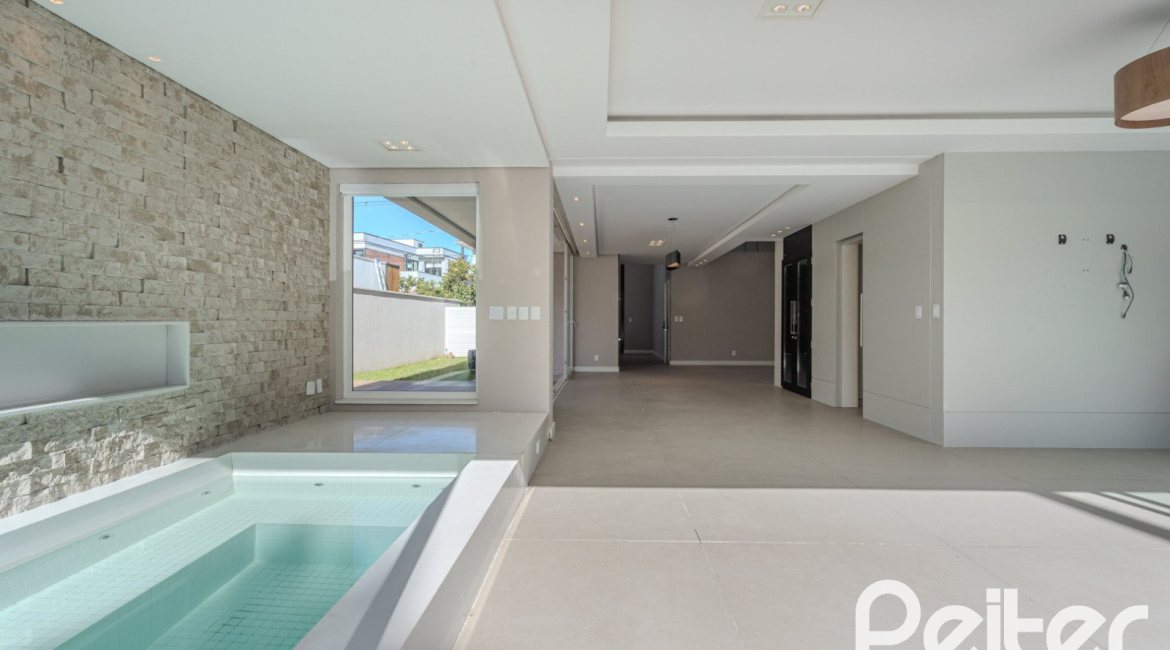 Casa em Condomínio à venda com 400m², 4 dormitórios, 4 suítes, 4 vagas, no bairro Alphaville em PORTO ALEGRE