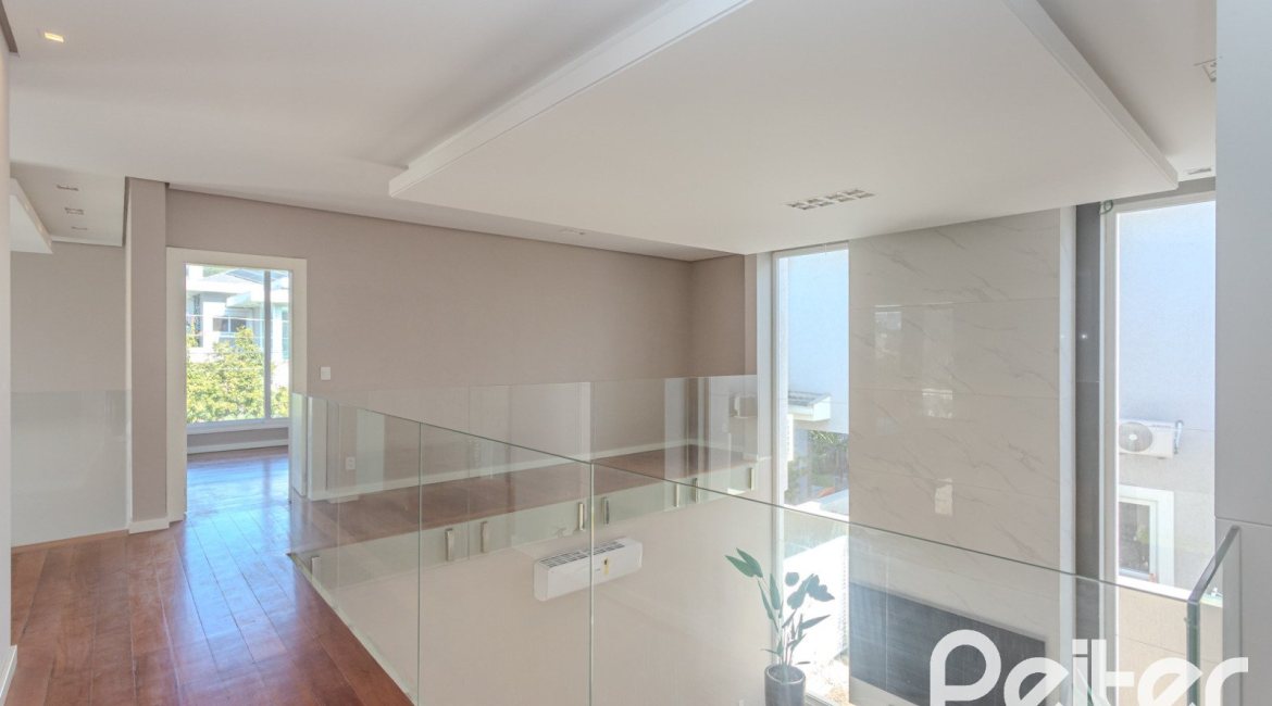 Casa em Condomínio à venda com 400m², 4 dormitórios, 4 suítes, 4 vagas, no bairro Alphaville em PORTO ALEGRE