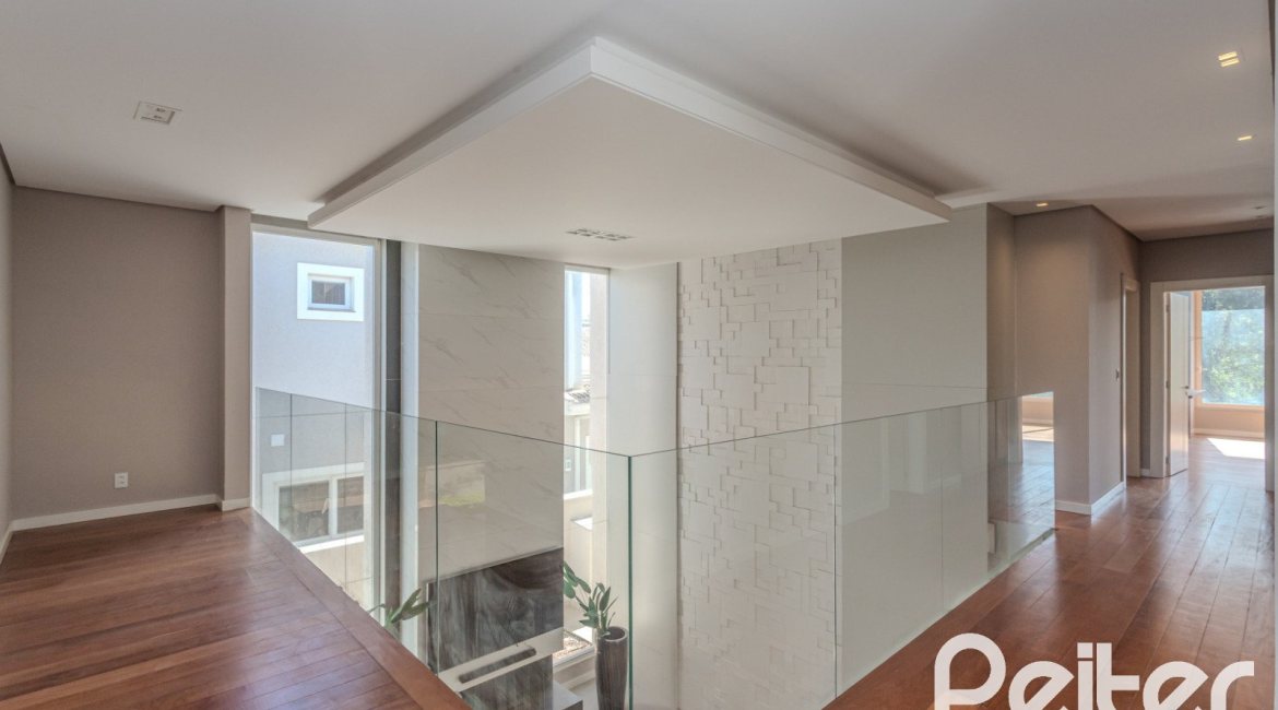 Casa em Condomínio à venda com 400m², 4 dormitórios, 4 suítes, 4 vagas, no bairro Alphaville em PORTO ALEGRE