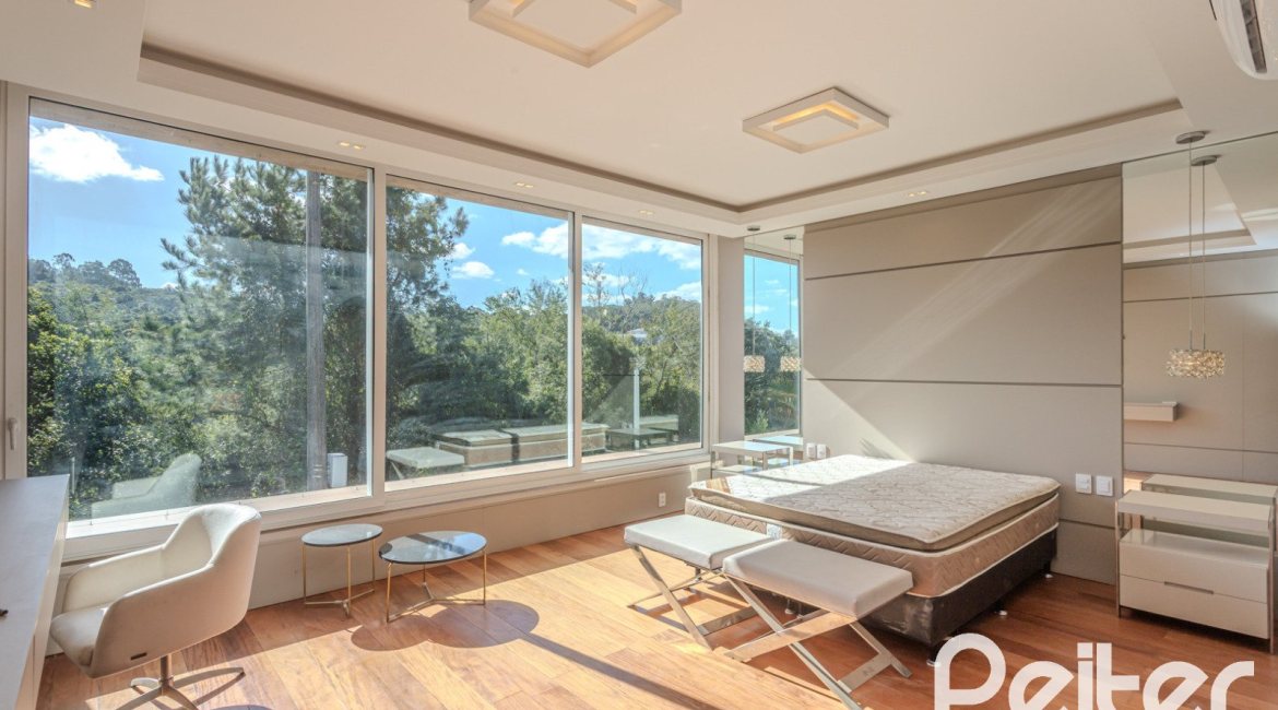 Casa em Condomínio à venda com 400m², 4 dormitórios, 4 suítes, 4 vagas, no bairro Alphaville em PORTO ALEGRE