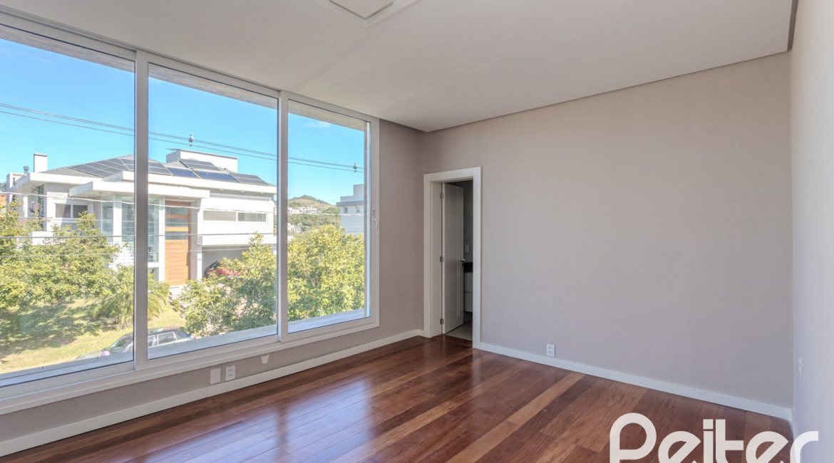 Casa em Condomínio à venda com 400m², 4 dormitórios, 4 suítes, 4 vagas, no bairro Alphaville em PORTO ALEGRE