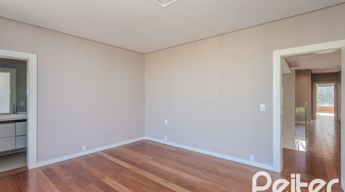 Casa em Condomínio à venda com 400m², 4 dormitórios, 4 suítes, 4 vagas, no bairro Alphaville em PORTO ALEGRE