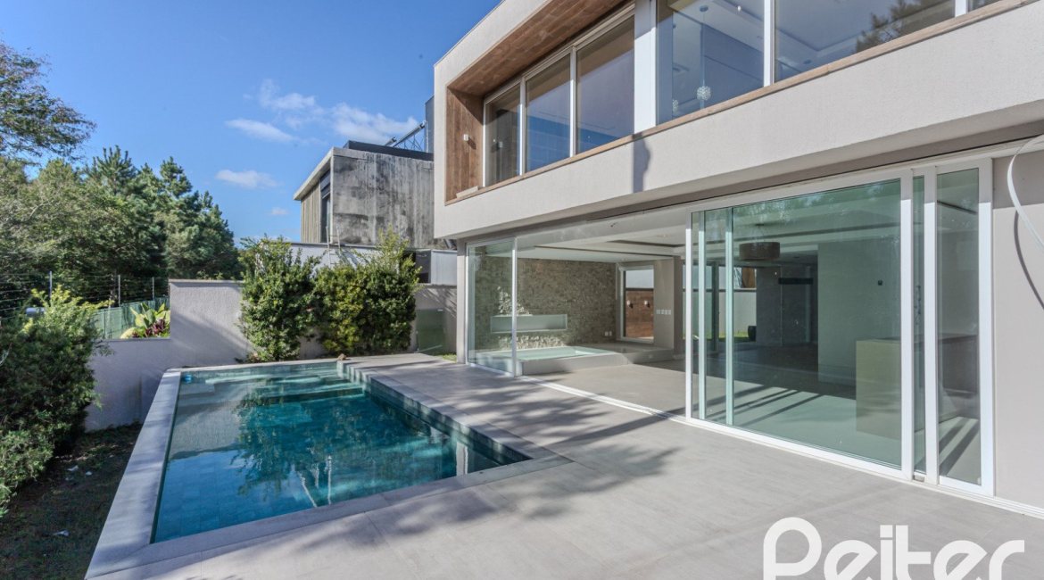 Casa em Condomínio à venda com 400m², 4 dormitórios, 4 suítes, 4 vagas, no bairro Alphaville em PORTO ALEGRE