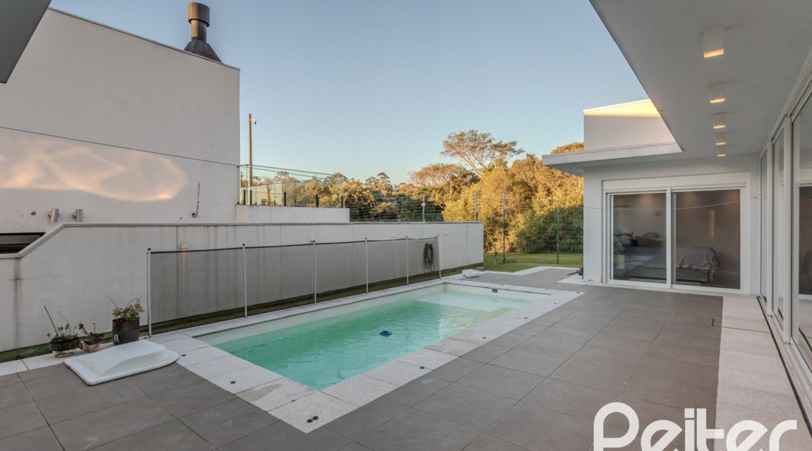 Casa em Condomínio à venda com 206m², 3 dormitórios, 3 suítes, 7 vagas, no bairro Alphaville em PORTO ALEGRE