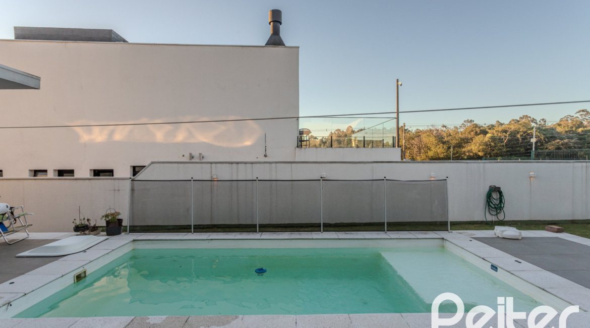 Casa em Condomínio à venda com 206m², 3 dormitórios, 3 suítes, 7 vagas, no bairro Alphaville em PORTO ALEGRE