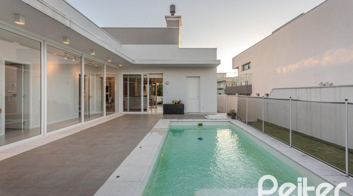 Casa em Condomínio à venda com 206m², 3 dormitórios, 3 suítes, 7 vagas, no bairro Alphaville em PORTO ALEGRE