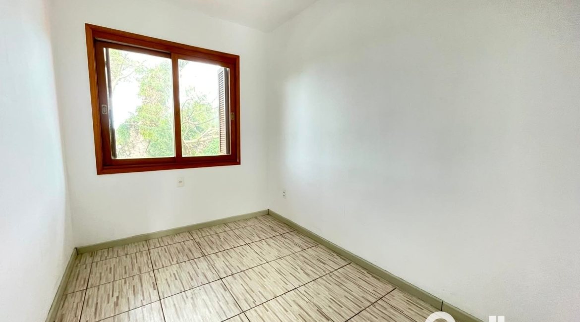 Casa em Condomínio à venda com 97m², 3 dormitórios, 1 suíte, 2 vagas, no bairro Guarujá em Porto Alegre
