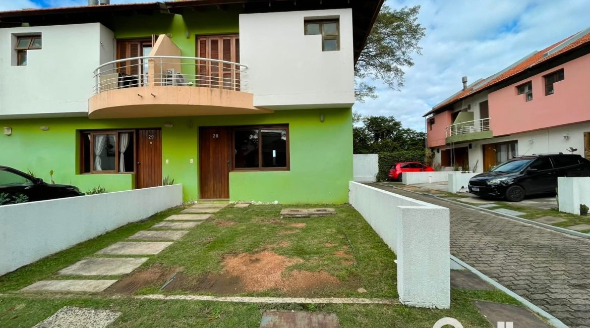 Casa em Condomínio à venda com 97m², 3 dormitórios, 1 suíte, 2 vagas, no bairro Guarujá em Porto Alegre