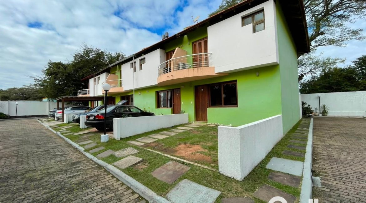 Casa em Condomínio à venda com 97m², 3 dormitórios, 1 suíte, 2 vagas, no bairro Guarujá em Porto Alegre