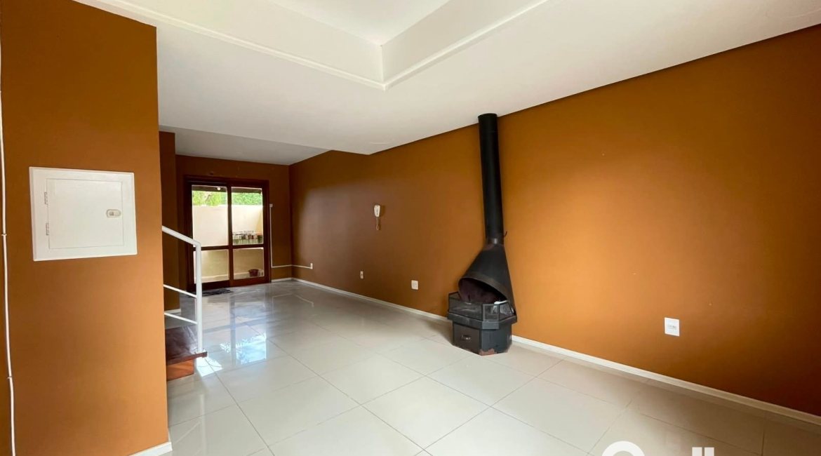Casa em Condomínio à venda com 97m², 3 dormitórios, 1 suíte, 2 vagas, no bairro Guarujá em Porto Alegre