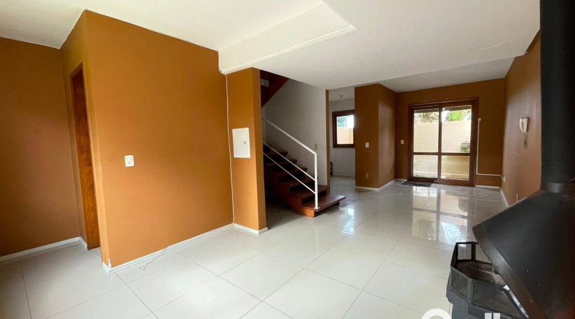 Casa em Condomínio à venda com 97m², 3 dormitórios, 1 suíte, 2 vagas, no bairro Guarujá em Porto Alegre