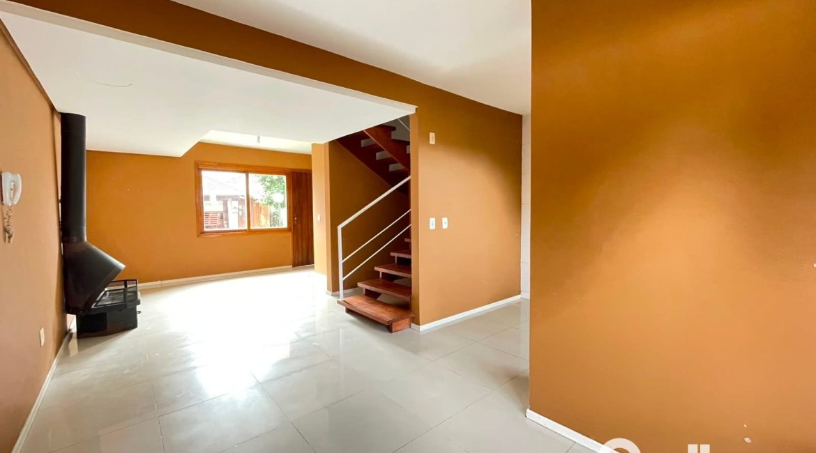 Casa em Condomínio à venda com 97m², 3 dormitórios, 1 suíte, 2 vagas, no bairro Guarujá em Porto Alegre