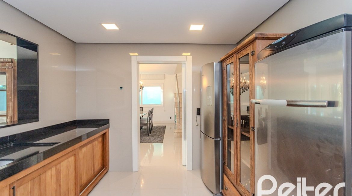 Casa em Condomínio à venda com 361m², 3 dormitórios, 3 suítes, no bairro Terra Ville em PORTO ALEGRE