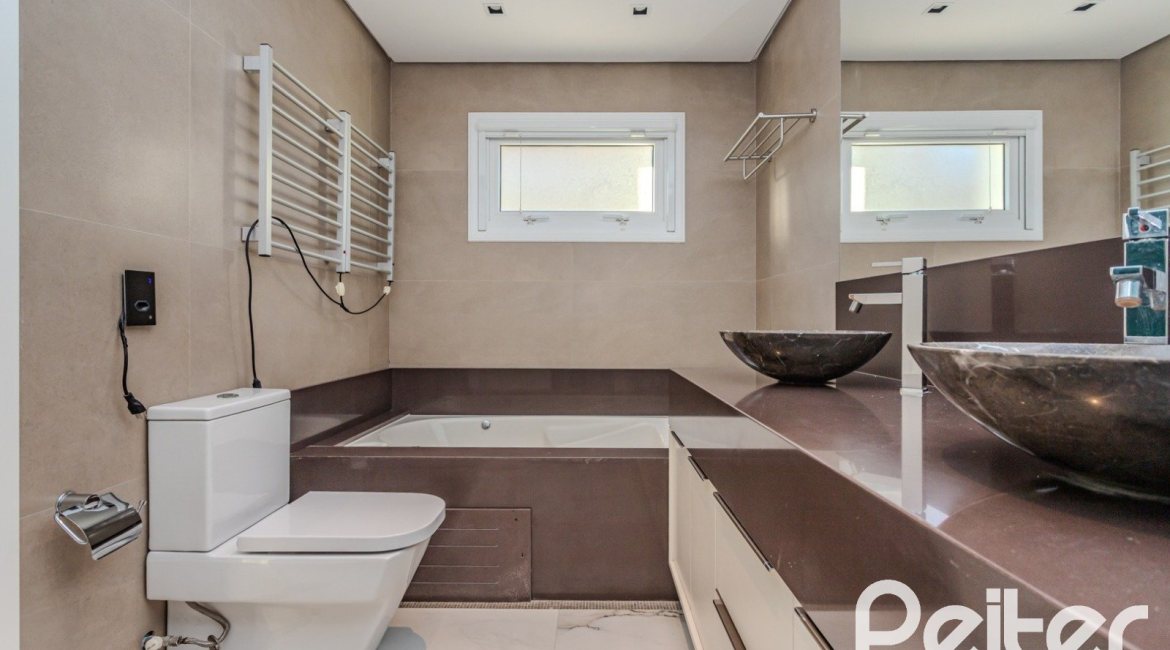 Casa em Condomínio à venda com 361m², 3 dormitórios, 3 suítes, no bairro Terra Ville em PORTO ALEGRE