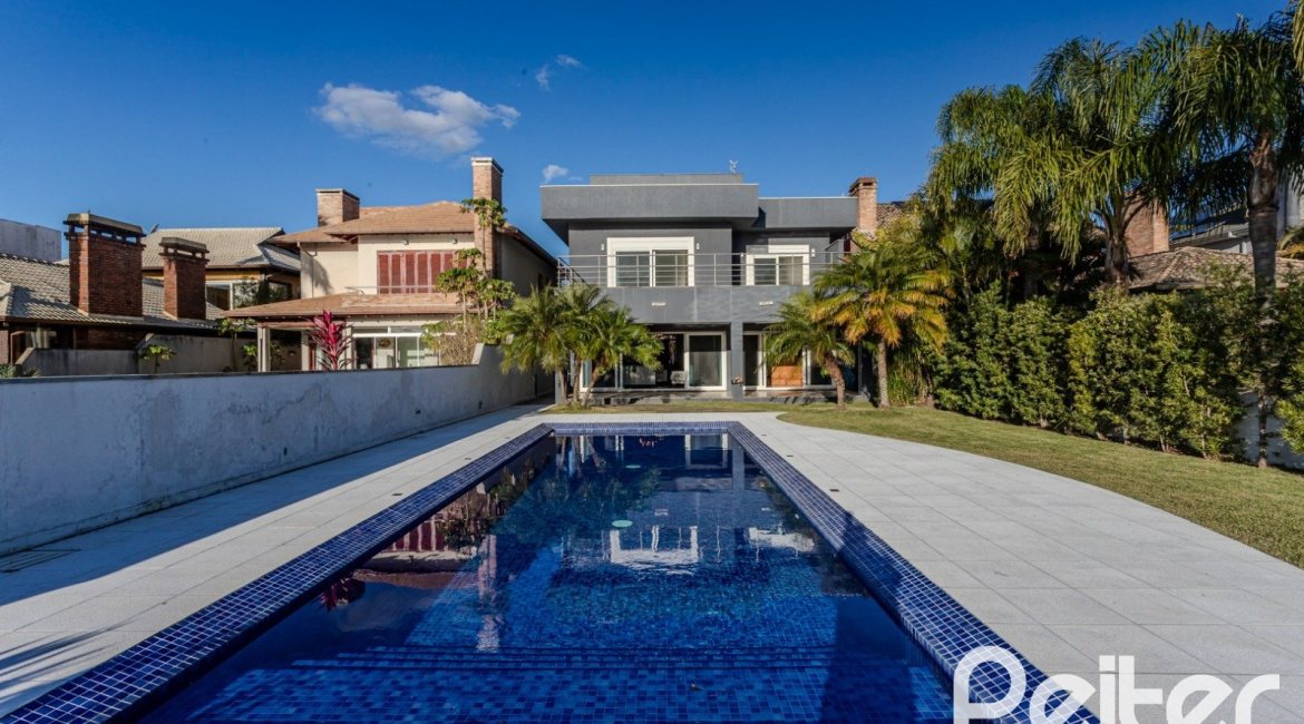 Casa em Condomínio à venda com 361m², 3 dormitórios, 3 suítes, no bairro Terra Ville em PORTO ALEGRE