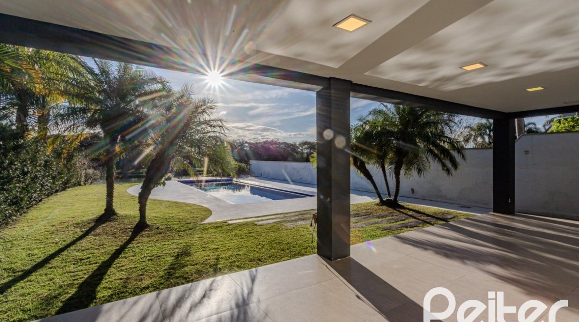 Casa em Condomínio à venda com 361m², 3 dormitórios, 3 suítes, no bairro Terra Ville em PORTO ALEGRE