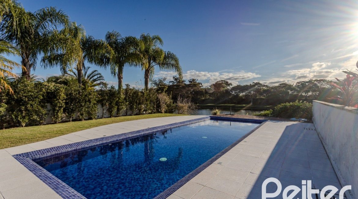Casa em Condomínio à venda com 361m², 3 dormitórios, 3 suítes, no bairro Terra Ville em PORTO ALEGRE