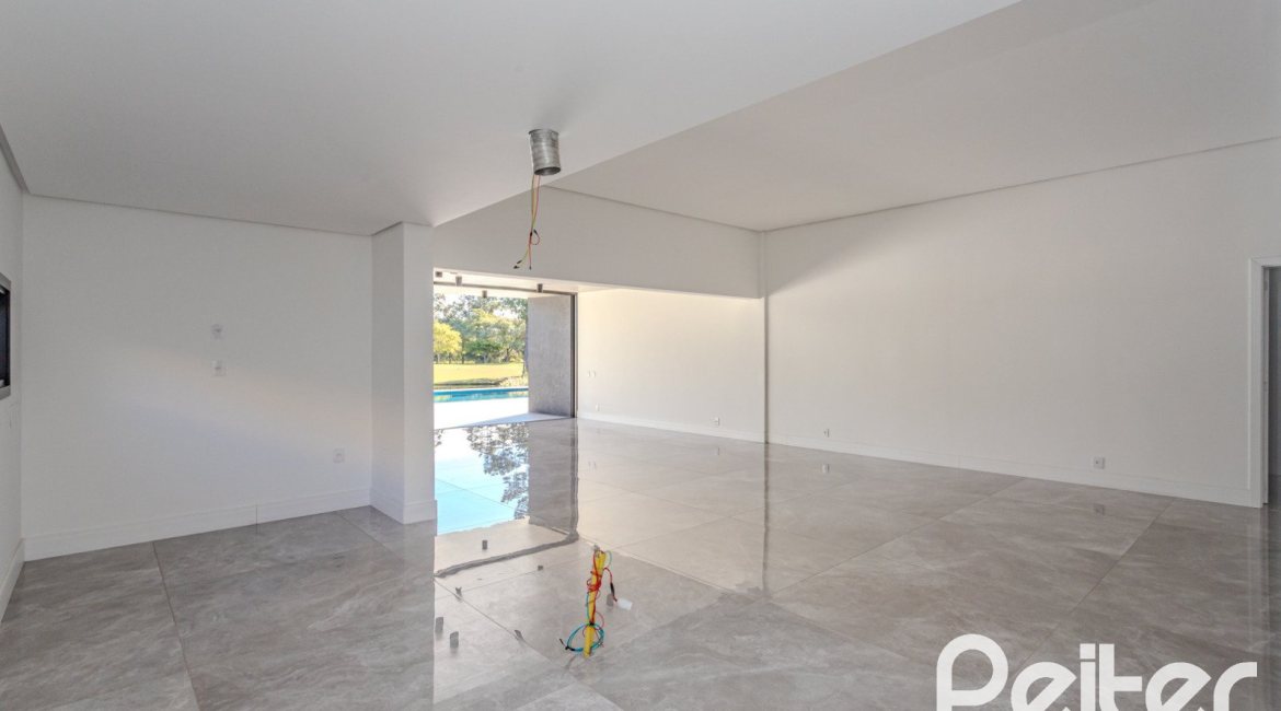 Casa em Condomínio à venda com 392m², 4 dormitórios, 4 suítes, 4 vagas, no bairro Terra Ville em PORTO ALEGRE