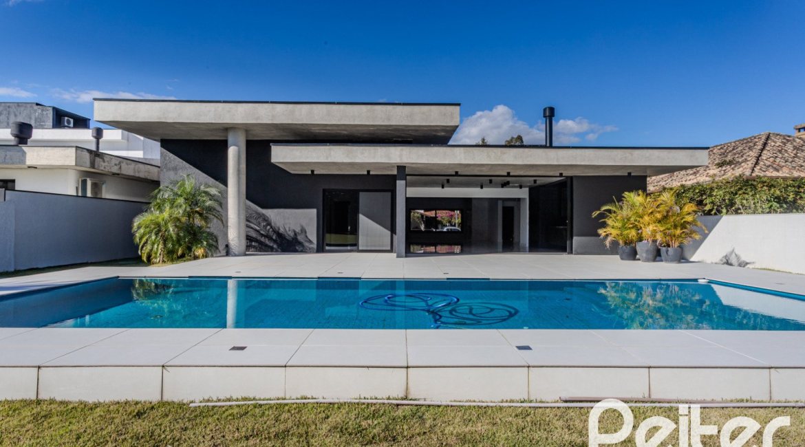 Casa em Condomínio à venda com 392m², 4 dormitórios, 4 suítes, 4 vagas, no bairro Terra Ville em PORTO ALEGRE